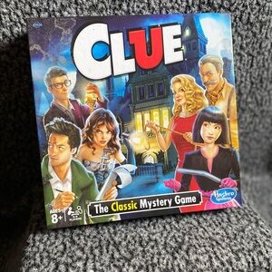 Hasbro Clue Mystery Game - Red, Blue, Yellow, Black
